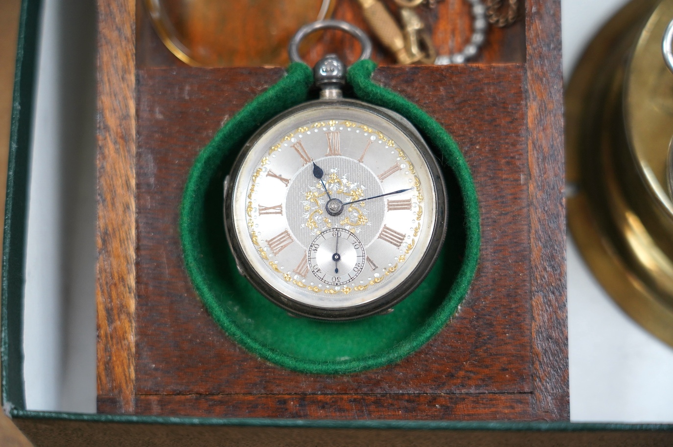 A George V silver Hebdomas eight day patent pocket watch, a late Victorian silver open face pocket watch and two watch cases. Condition - poor to fair